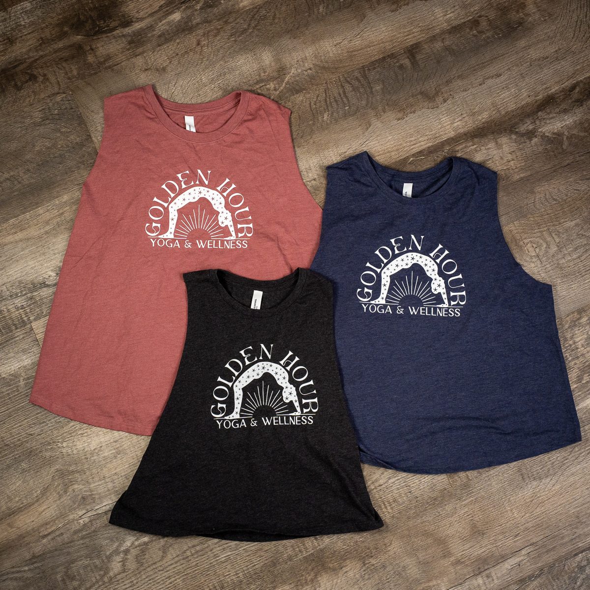 Golden Hour Yoga & Wellness cropped tank tops printed in three colors